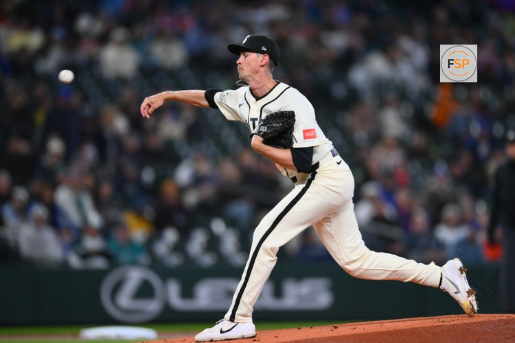 Mar 29, 2026; Seattle, Washington, USA; Seattle Mariners starting pitcher Emerson Hancock (26) pitches to the Cleveland Guardians during the first inning at T-Mobile Park. Credit: Steven Bisig-Imagn Images