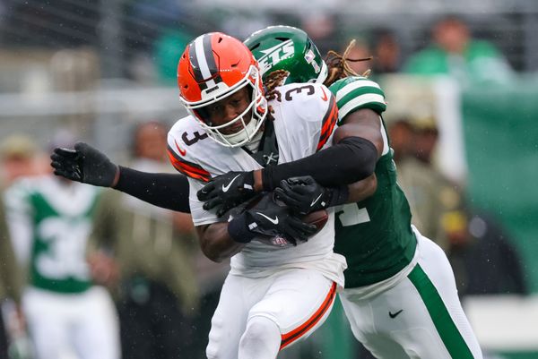 Nov 9, 2025; East Rutherford, New Jersey, USA; Cleveland Browns wide receiver Jerry Jeudy (3) is tackled by New York Jets linebacker Jamien Sherwood (44) during the first half at MetLife Stadium. Mandatory Credit: Vincent Carchietta-Imagn Images