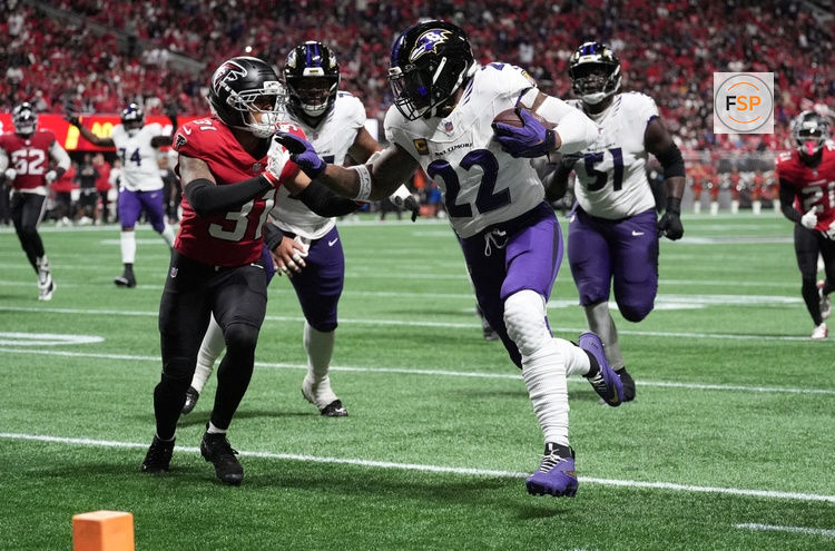 Oct 11, 2026; Atlanta, Georgia, USA;  Baltimore Ravens running back Derrick Henry (22) scores a touchdown during the third quarter against Atlanta Falcons safety Xavier Watts (31) at Mercedes-Benz Stadium.  Credit: Dale Zanine-Imagn Images