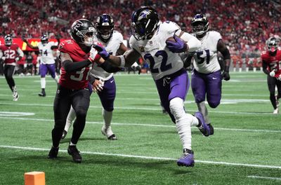 Oct 11, 2026; Atlanta, Georgia, USA;  Baltimore Ravens running back Derrick Henry (22) scores a touchdown during the third quarter against Atlanta Falcons safety Xavier Watts (31) at Mercedes-Benz Stadium.  Mandatory Credit: Dale Zanine-Imagn Images