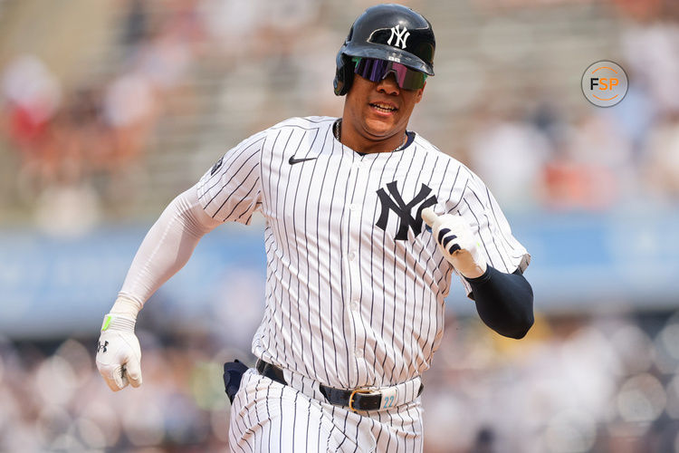 BRONX, NY - JULY 20: New York Yankees outfielder Juan Soto (22) runs to third base during a game between the Tampa Bay Rays and the New York Yankees on July 20, 2024 at Yankee Stadium in the Bronx, New York. (Photo by Andrew Mordzynski/Icon Sportswire)