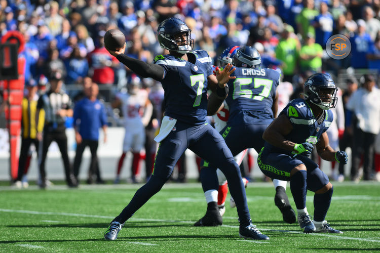 Oct 6, 2024; Seattle, Washington, USA; Seattle Seahawks quarterback Geno Smith (7) passes the ball against the New York Giants during the first half at Lumen Field. Credit: Steven Bisig-Imagn Images