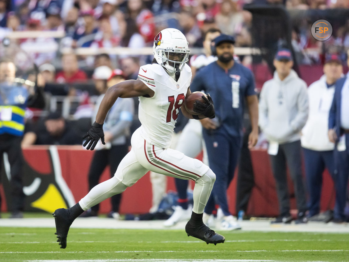 Dec 15, 2024; Glendale, Arizona, USA; Arizona Cardinals wide receiver Marvin Harrison Jr. (18) against the New England Patriots at State Farm Stadium. Credit: Mark J. Rebilas-Imagn Images