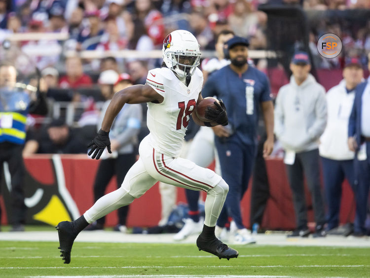 Dec 15, 2024; Glendale, Arizona, USA; Arizona Cardinals wide receiver Marvin Harrison Jr. (18) against the New England Patriots at State Farm Stadium. Credit: Mark J. Rebilas-Imagn Images