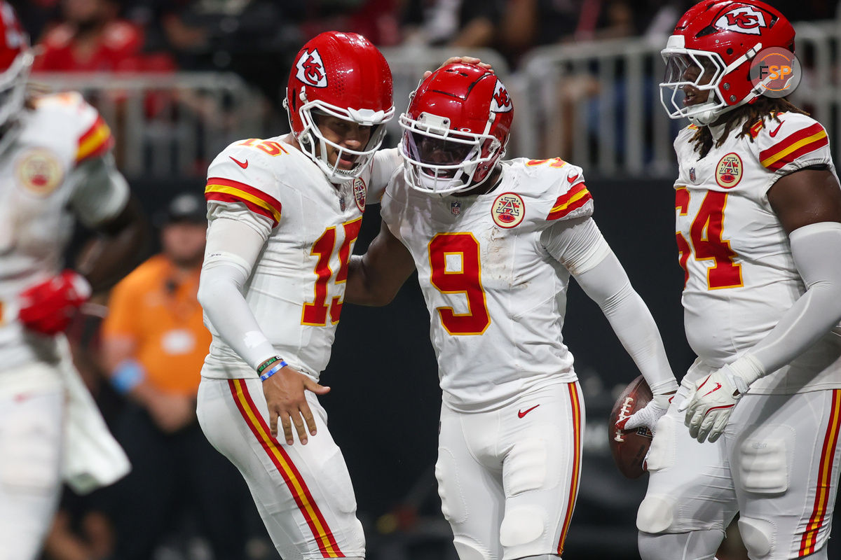 Sep 22, 2024; Atlanta, Georgia, USA; Kansas City Chiefs quarterback Patrick Mahomes (15) and wide receiver JuJu Smith-Schuster (9) celebrate after a touchdown against the Atlanta Falcons in the third quarter at Mercedes-Benz Stadium. Credit: Brett Davis-Imagn Images