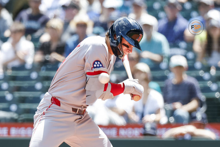 Jun 18, 2025; Seattle, Washington, USA; Boston Red Sox right fielder Roman Anthony (19) is hit by a pitch during the first inning against the Seattle Mariners at T-Mobile Park. Credit: Joe Nicholson-Imagn Images