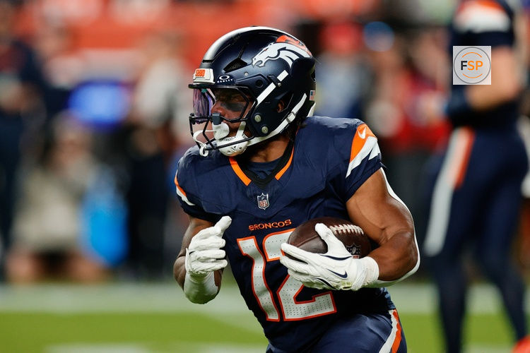 Sep 29, 2025; Denver, Colorado, USA; Denver Broncos running back RJ Harvey (12) rushes during the second quarter against the Cincinnati Bengals at Empower Field at Mile High. Credit: Isaiah J. Downing-Imagn Images