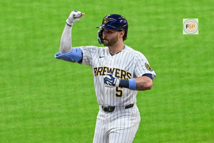 Mar 28, 2026; Milwaukee, Wisconsin, USA;  Milwaukee Brewers center fielder Garrett Mitchell (5) reacts after driving in two runs with a base hit against the Chicago White Sox in the first inning at American Family Field. Credit: Benny Sieu-Imagn Images