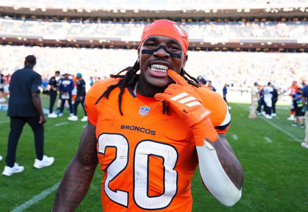 Sep 20, 2026; Denver, Colorado, USA;  Denver Broncos running back Jonah Coleman (20) celebrates on the field after defeating the Jacksonville Jaguars at Empower Field at Mile High.  Mandatory Credit: Ron Chenoy-Imagn Images