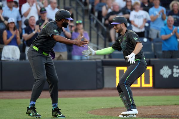 May 23, 2025; St. Petersburg, Florida, USA;  Tampa Bay Rays second base Brandon Lowe (8) is congratulated by third base Junior Caminero (13) after a two-run home run during the third inning against the Toronto Blue Jays at George M. Steinbrenner Field. Mandatory Credit: Kim Klement Neitzel-Imagn Images