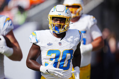 Oct 13, 2024; Denver, Colorado, USA; Los Angeles Chargers running back Kimani Vidal (30) following a touchdown in the first quarter against the Denver Broncos at Empower Field at Mile High. Mandatory Credit: Ron Chenoy-Imagn Images