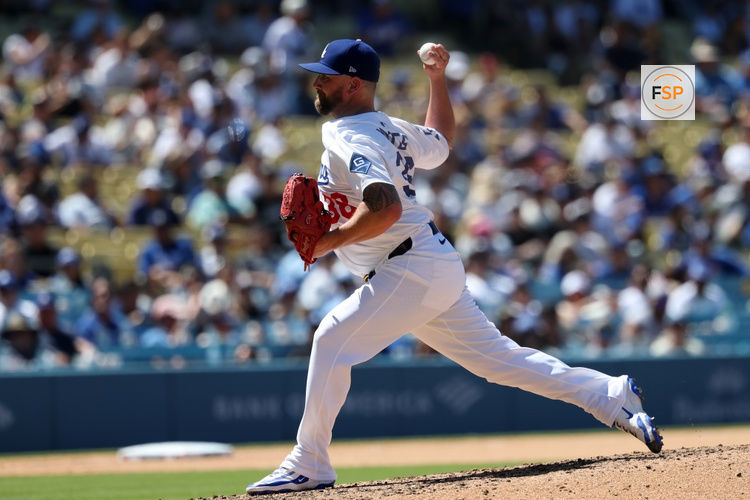 Jul 23, 2025; Los Angeles, California, USA;  Los Angeles Dodgers relief pitcher Kirby Yates (38) pitches during the eighth inning against the Minnesota Twins at Dodger Stadium. Credit: Kiyoshi Mio-Imagn Images