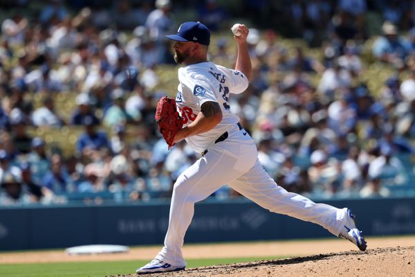 Jul 23, 2025; Los Angeles, California, USA;  Los Angeles Dodgers relief pitcher Kirby Yates (38) pitches during the eighth inning against the Minnesota Twins at Dodger Stadium. Mandatory Credit: Kiyoshi Mio-Imagn Images