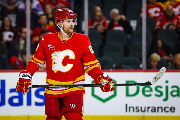 Dec 31, 2025; Calgary, Alberta, CAN; Calgary Flames left wing Blake Coleman (20) against the Philadelphia Flyers during the third period at Scotiabank Saddledome. Mandatory Credit: Sergei Belski-Imagn Images