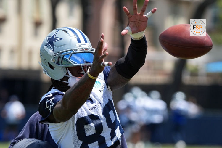 Jul 26, 2025; Oxnard, CA, USA; Dallas Cowboys receiver CeeDee Lamb (88) catches the ball at training camp at the River Ridge Fields. Credit: Kirby Lee-Imagn Images