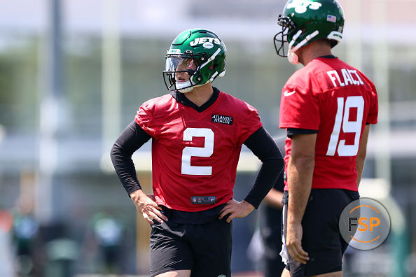 FLORHAM PARK, NJ - JUNE 15: Quarterbacks Zach Wilson #2 and Joe Flacco #19 of the New York Jets practice during New York Jets mandatory minicamp at Atlantic Health Jets Training Center on June 15, 2022 in Florham Park, New Jersey. (Photo by Rich Schultz/Getty Images)