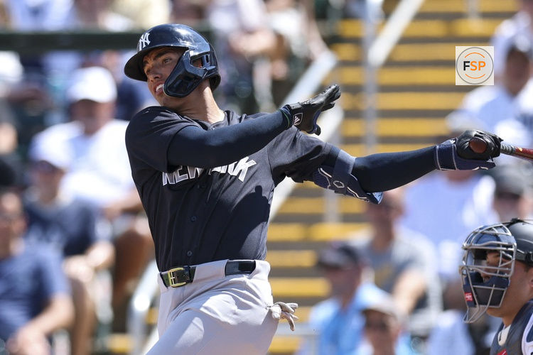 Feb 27, 2026; Fort Myers, Florida, USA; New York Yankees shortstop George Lombard Jr. (96) hits a two-rbi single against the Minnesota Twins in the first inning during spring training at Lee Health Sports Complex/Hammond Stadium. Credit: Nathan Ray Seebeck-Imagn Images