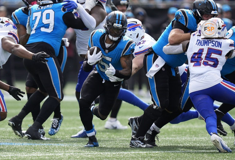 Oct 26, 2025; Charlotte, North Carolina, USA; Carolina Panthers running back Rico Dowdle (5) runs during the first half against the Buffalo Bills at Bank of America Stadium. Credit: Jim Dedmon-Imagn Images