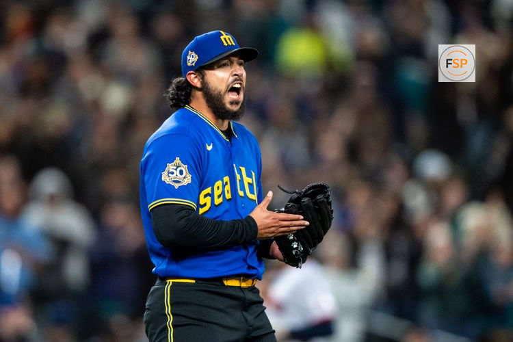 Mar 27, 2026; Seattle, Washington, USA; Seattle Mariners relief pitcher Andres Munoz (75) celebrates after a game against the Cleveland Guardians at T-Mobile Park. Credit: Stephen Brashear-Imagn Images