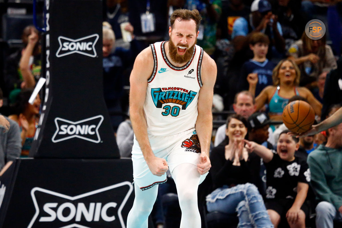 Oct 26, 2024; Memphis, Tennessee, USA; Memphis Grizzlies center Jay Huff (30) reacts after a dunk during the first half against the Orlando Magic at FedExForum. Credit: Petre Thomas-Imagn Images