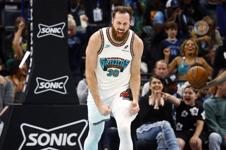 Oct 26, 2024; Memphis, Tennessee, USA; Memphis Grizzlies center Jay Huff (30) reacts after a dunk during the first half against the Orlando Magic at FedExForum. Credit: Petre Thomas-Imagn Images