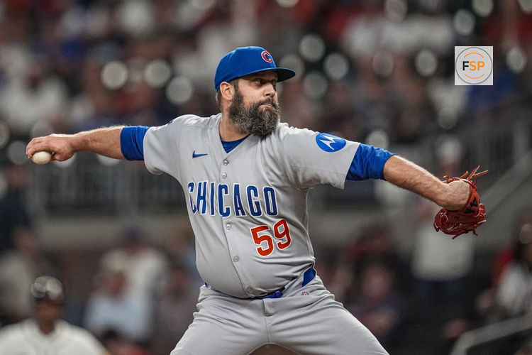 Sep 10, 2025; Cumberland, Georgia, USA; Chicago Cubs relief pitcher Andrew Kittredge (59) pitches against the Atlanta Braves during the ninth inning at Truist Park. Credit: Dale Zanine-Imagn Images