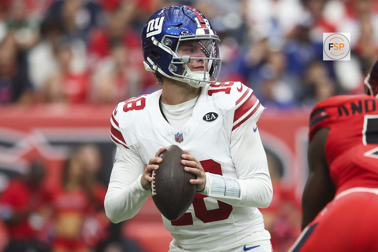 Oct 25, 2026; Houston, Texas, USA;  New York Giants quarterback J.J. McCarthy (18) passes the ball during the second quarter against the Houston Texans at Reliant Stadium.  Credit: Troy Taormina-Imagn Images