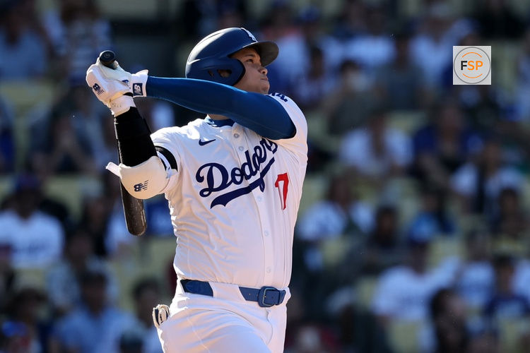 Sep 22, 2024; Los Angeles, California, USA;  Los Angeles Dodgers designated hitter Shohei Ohtani (17) hits a home run during the ninth inning against the Colorado Rockies at Dodger Stadium. Credit: Kiyoshi Mio-Imagn Images