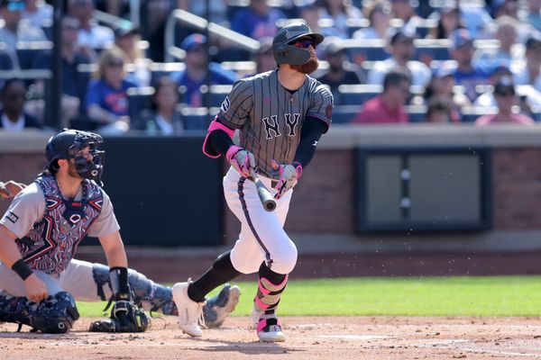 Jul 5, 2025; New York City, New York, USA; New York Mets left fielder Brandon Nimmo (9) follows through on a grand slam against the New York Yankees during the first inning at Citi Field. Mandatory Credit: Brad Penner-Imagn Images