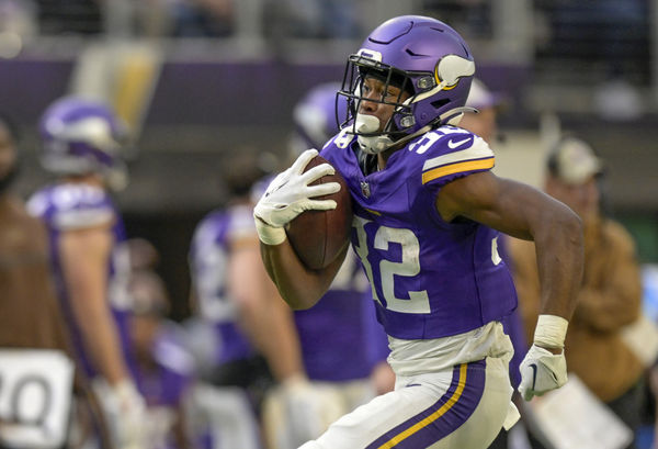 MINNEAPOLIS, MN - NOVEMBER 12: Minnesota Vikings running back Ty Chandler (32) runs with the ball during an NFL game between the Minnesota Vikings and New Orleans Saints on November 12, 2023, at U.S. Bank Stadium in Minneapolis, MN. (Photo by Nick Wosika/Icon Sportswire)