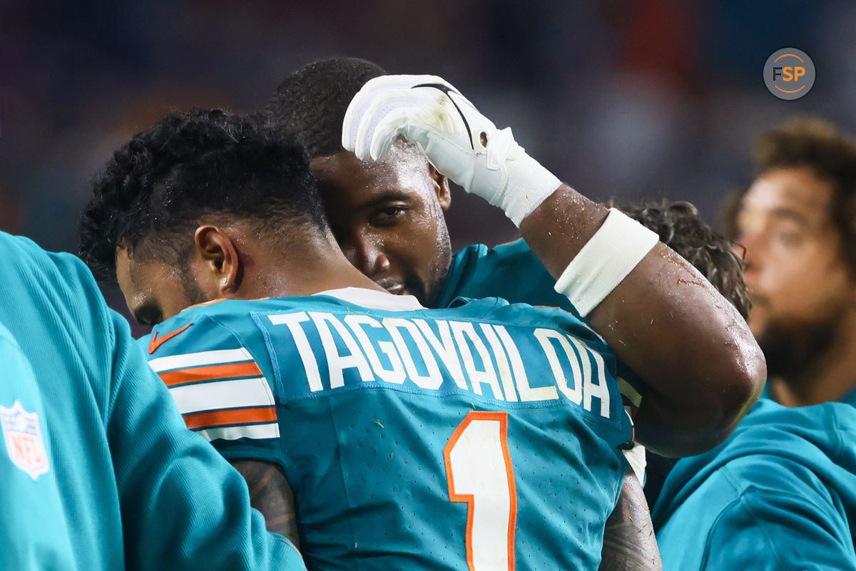 Sep 12, 2024; Miami Gardens, Florida, USA; Miami Dolphins quarterback Tua Tagovailoa (1) walks off the field after an apparent injury against the Buffalo Bills during the third quarter at Hard Rock Stadium. Credit: Sam Navarro-Imagn Images