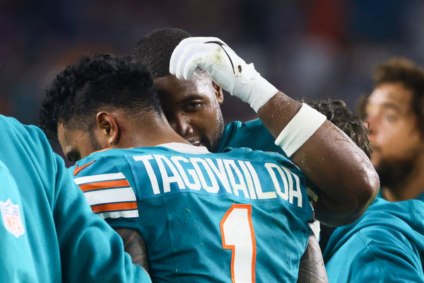 Sep 12, 2024; Miami Gardens, Florida, USA; Miami Dolphins quarterback Tua Tagovailoa (1) walks off the field after an apparent injury against the Buffalo Bills during the third quarter at Hard Rock Stadium. Mandatory Credit: Sam Navarro-Imagn Images