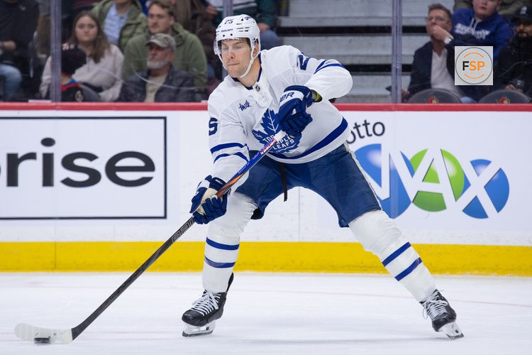 Mar 21, 2026; Ottawa, Ontario, CAN; Toronto Maple Leafs defenseman Brandon Carlo (25) shoots the puck in the first period against the Ottawa Senators at the Canadian Tire Centre. Credit: Marc DesRosiers-IMAGN Images