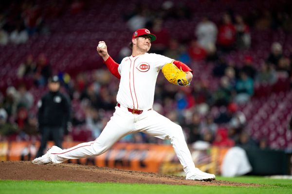 Apr 15, 2025; Cincinnati, Ohio, USA;  Emilio Pagan pitches in the ninth inning of the MLB game between Cincinnati Reds and Seattle Mariners at at Great American Ball Park. Mandatory Credit: Albert Cesare/USA TODAY Network via Imagn Images