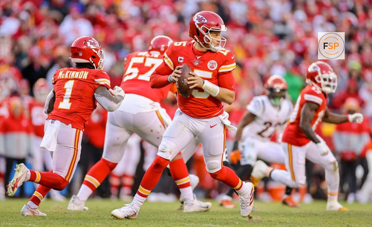 KANSAS CITY, MO - JANUARY 30: Patrick Mahomes #15 of the Kansas City Chiefs looks for an open receiver during the first quarter of the AFC Championship Game against the Cincinnati Bengals at Arrowhead Stadium on January 30, 2022 in Kansas City, Missouri, United States. (Photo by David Eulitt/Getty Images)