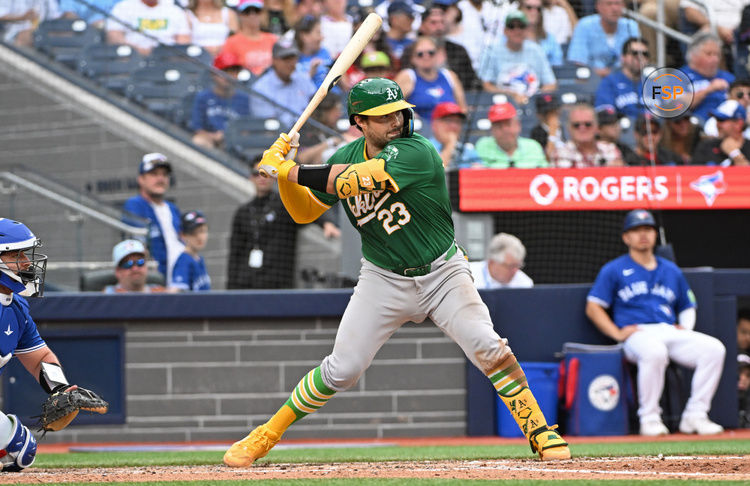 Aug 10, 2024; Toronto, Ontario, CAN; Oakland Athletics catcher Shea Langeliers (23) bats against the Toronto Blue Jays at Rogers Centre. Credit: Gerry Angus-USA TODAY Sports