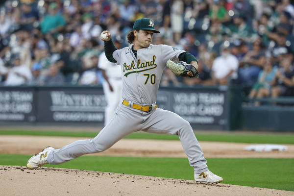 Sep 14, 2024; Chicago, Illinois, USA; Oakland Athletics starting pitcher J.T. Ginn (70) delivers a pitch against the Chicago White Sox during the first inning at Guaranteed Rate Field. Mandatory Credit: Kamil Krzaczynski-Imagn Images