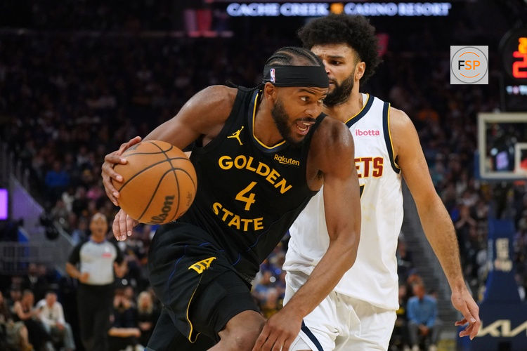 Feb 22, 2026; San Francisco, California, USA;  Golden State Warriors guard Moses Moody (4) dribbles by Denver Nuggets guard Jamal Murray (27) in the second quarter at Chase Center. Credit: David Gonzales-Imagn Images