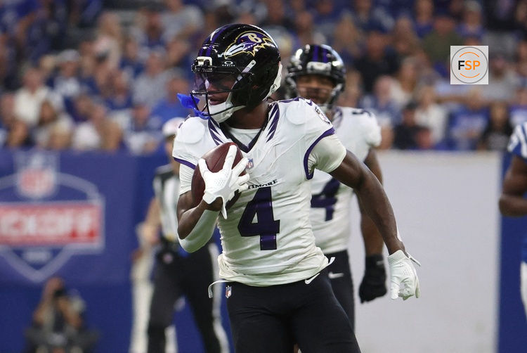 Sep 13, 2026; Indianapolis, Indiana, USA;  Baltimore Ravens wide receiver Zay Flowers (4) runs with the ball for a touchdown against the Indianapolis Colts at Lucas Oil Stadium.  Credit: Trevor Ruszkowski-Imagn Images