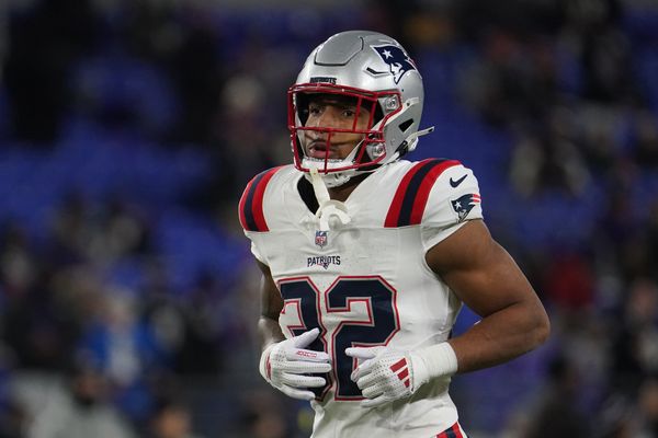 Dec 21, 2025; Baltimore, Maryland, USA;  New England Patriots running back Treveyon Henderson (32) warms up prior to the game against the Baltimore Ravens at M&T Bank Stadium. Mandatory Credit: James Lang-Imagn Images