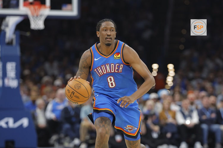 Oct 22, 2026; Oklahoma City, Oklahoma, USA; Oklahoma City Thunder guard Jalen Williams (8) dribbles the ball down the court against the Denver Nuggets during the first half at Paycom Center. Credit: Alonzo Adams-Imagn Images