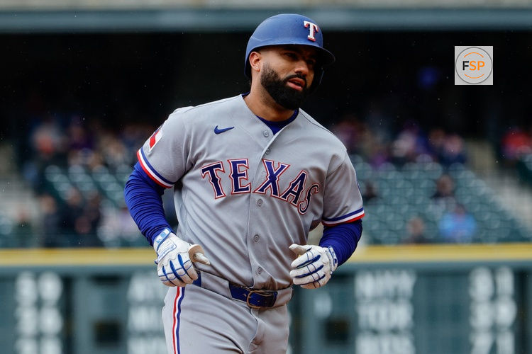 May 20, 2026; Denver, Colorado, USA; Texas Rangers shortstop Ezequiel Duran (20) rounds the bases on a two run home run in the fourth inning against the Colorado Rockies at Coors Field. Credit: Isaiah J. Downing-Imagn Images