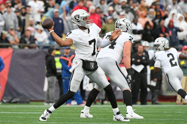 Sep 7, 2025; Foxborough, Massachusetts, USA; Las Vegas Raiders quarterback Geno Smith (7) drops back to pass against the New England Patriots at Gillette Stadium. Mandatory Credit: Bob DeChiara-Imagn Images