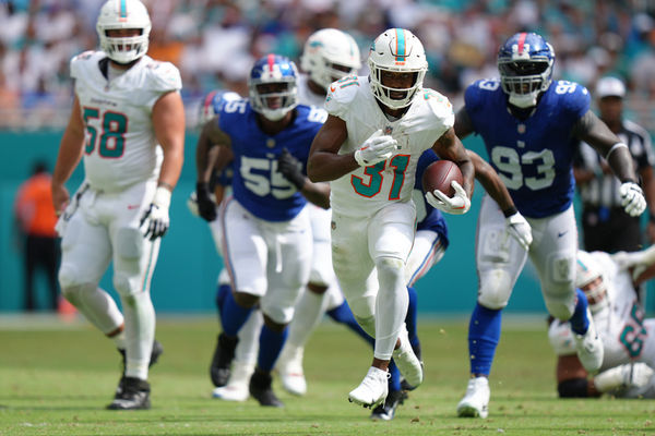 MIAMI GARDENS, FL - OCTOBER 08: Miami Dolphins running back Raheem Mostert (31) break free for a long run during the game between the New York Giants and the Miami Dolphins on Sunday, October 8, 2023 at Hard Rock Stadium, Miami Gardens, Fla. (Photo by Peter Joneleit/Icon Sportswire)