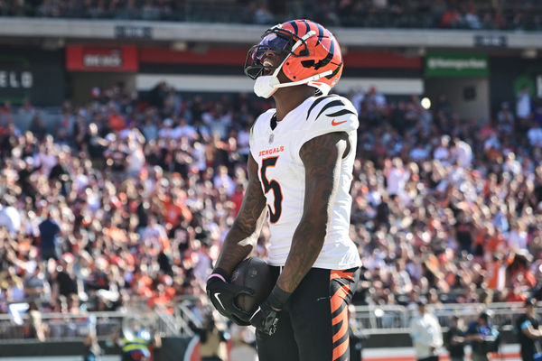 Oct 20, 2024; Cleveland, Ohio, USA; Cincinnati Bengals wide receiver Tee Higgins (5) celebrates after scoring a touchdown during the second half against the Cleveland Browns at Huntington Bank Field. Mandatory Credit: Ken Blaze-Imagn Images