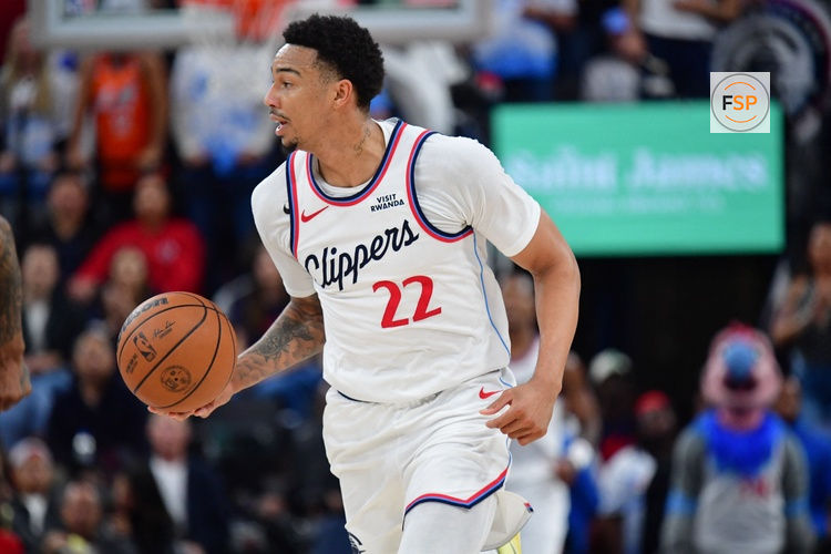 Apr 12, 2026; Inglewood, California, USA; Los Angeles Clippers guard Jordan Miller (22) moves the ball up court against the Golden State Warriors during the second half at Intuit Dome. Credit: Gary A. Vasquez-Imagn Images