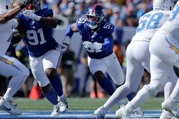 Sep 28, 2025; East Rutherford, New Jersey, USA; New York Giants linebacker Abdul Carter (51) rushes against the Los Angeles Chargers during the second quarter at MetLife Stadium. Mandatory Credit: Brad Penner-Imagn Images