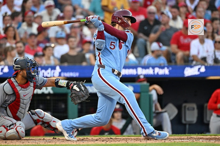 Aug 6, 2026; Philadelphia, Pennsylvania, USA; Philadelphia Phillies second baseman Bryson Stott (5) watches his RBI double during the third inning against the Washington Nationals at Citizens Bank Park. Credit: Eric Hartline-Imagn Images