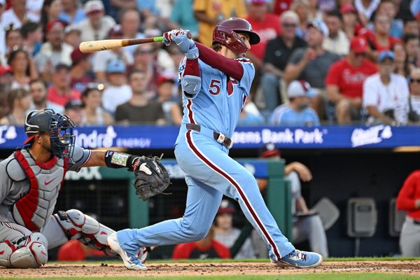 Aug 6, 2026; Philadelphia, Pennsylvania, USA; Philadelphia Phillies second baseman Bryson Stott (5) watches his RBI double during the third inning against the Washington Nationals at Citizens Bank Park. Mandatory Credit: Eric Hartline-Imagn Images