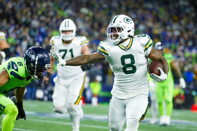 Dec 15, 2024; Seattle, Washington, USA; Green Bay Packers running back Josh Jacobs (8) rushes against the Seattle Seahawks during the first quarter at Lumen Field. Mandatory Credit: Joe Nicholson-Imagn Images